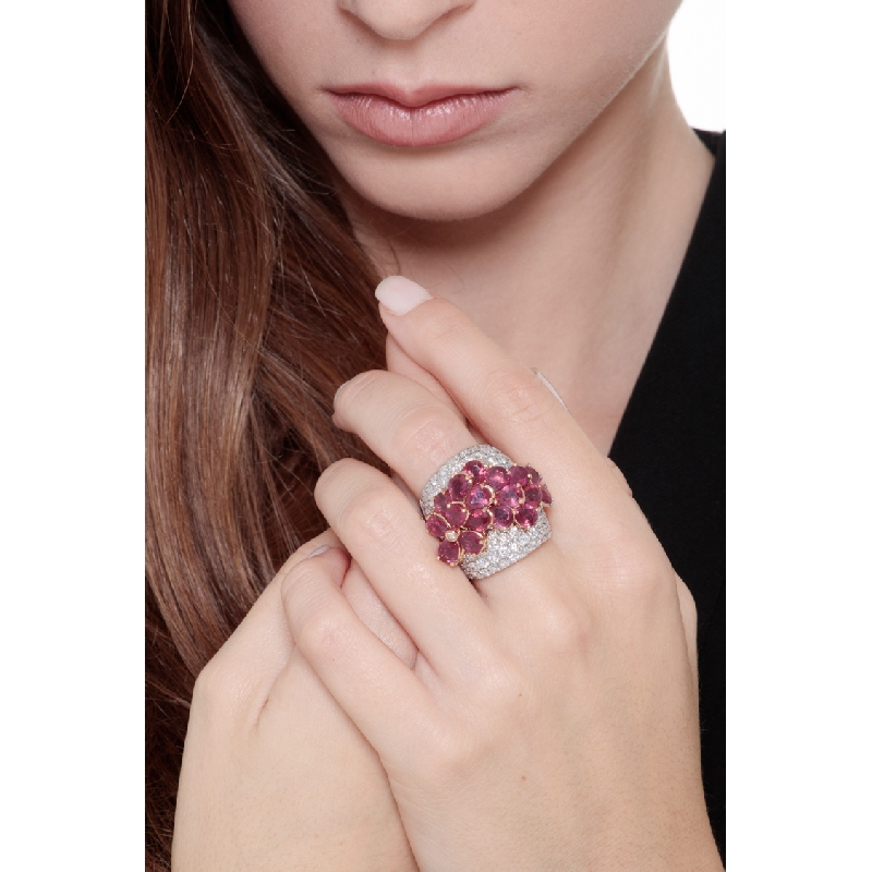 18k white gold band ring with rubies pear cut and diamonds 