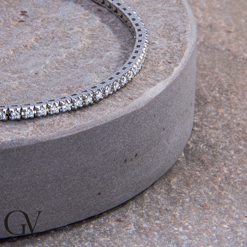 Bracciale Tennis a griffe in oro Bianco 18k con diamanti