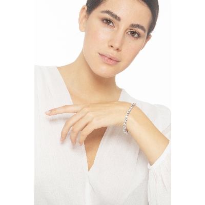 Bracciale tennis lineare a griffe in oro bianco 18k diamanti