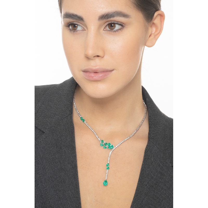 Fancy tennis necklace with emeralds and diamonds