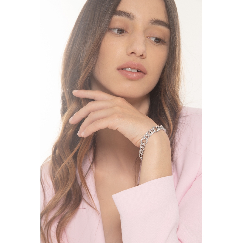 Bracciale groumette in oro bianco 18k composto da 27 maglie di misure differenti e alternate e diamanti