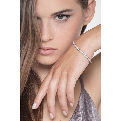 Bracciale Tennis lineare modello piramide in oro Bianco 18k con diamanti