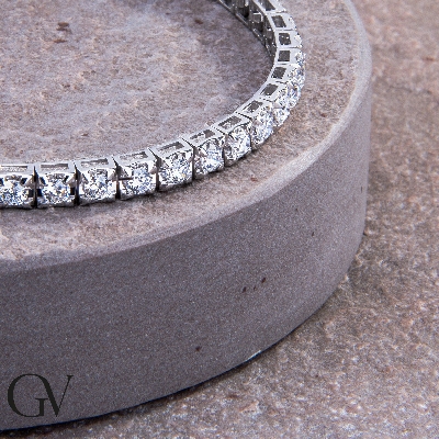 Bracciale Tennis lineare in oro bianco 18k con Diamanti. Larghezza maglia 4.00 mm