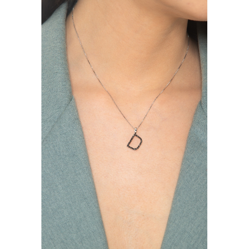 18k white gold letter D with black diamonds