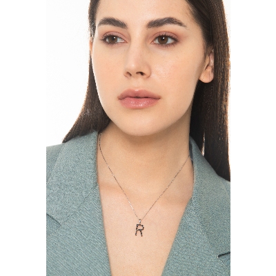 18k white gold letter R with black diamonds