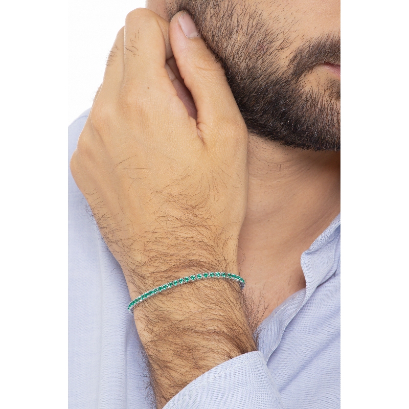 Pyramid links tennis bracelet with emeralds