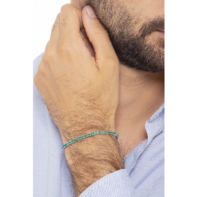 Pyramid links tennis bracelet with emeralds