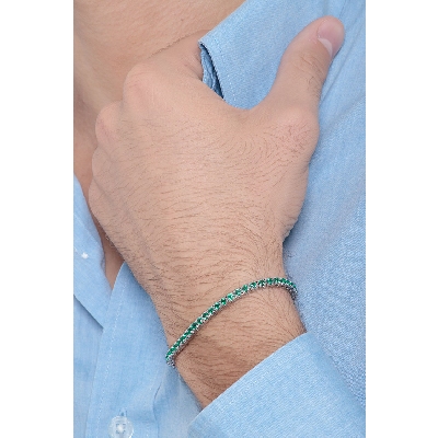 Tennis bracelet in 18k white gold with emeralds