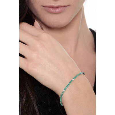 Square links tennis bracelet with emeralds and round cut diamonds