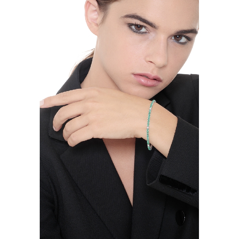 Wire tennis bracelet with emeralds and diamonds