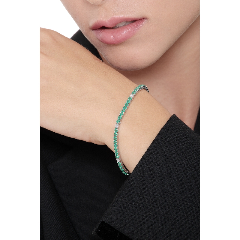 Wire tennis bracelet with emeralds and diamonds