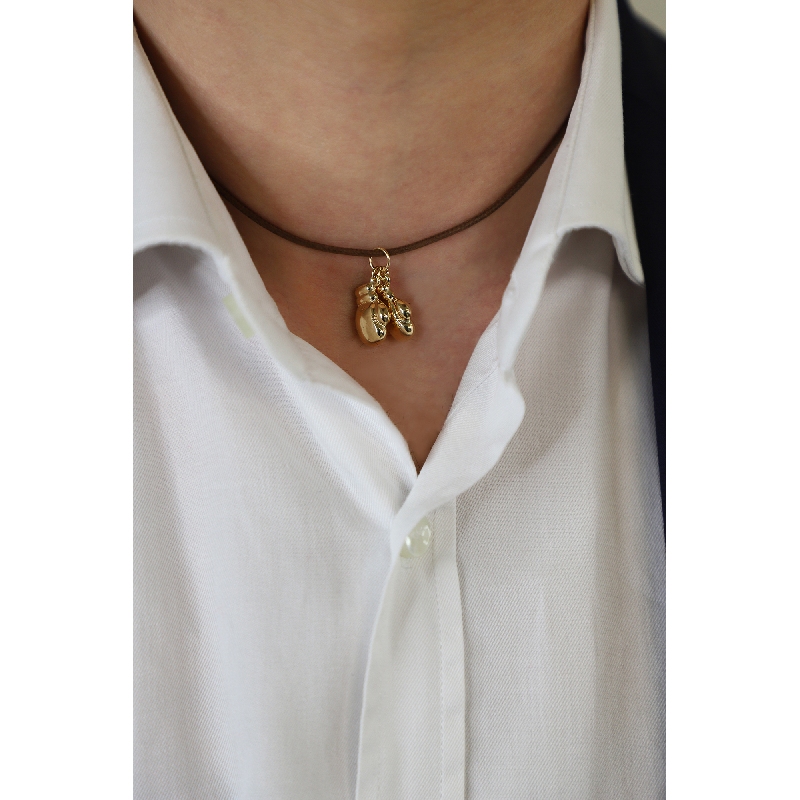 Boxing gloves pendant in 18k white and yellow gold