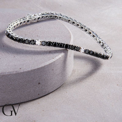 Tennis bracelet in white gold 18k with black and white diamonds
