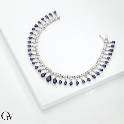 Bracciale tennis design in oro bianco 750 con zaffiri blu e diamanti