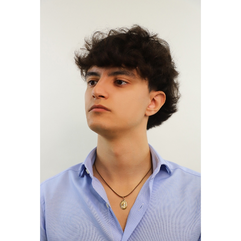 Medaglia sacra con Madonna in oro giallo 18k