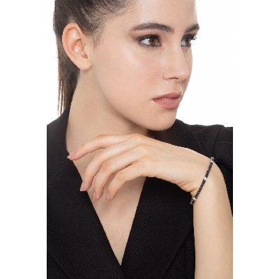 Bracciale Tennis in oro Bianco 18k con punte brunite diamanti neri e diamanti bianchi