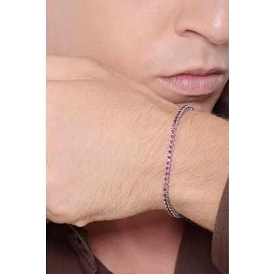 Pyramid top tennis bracelet with rubies