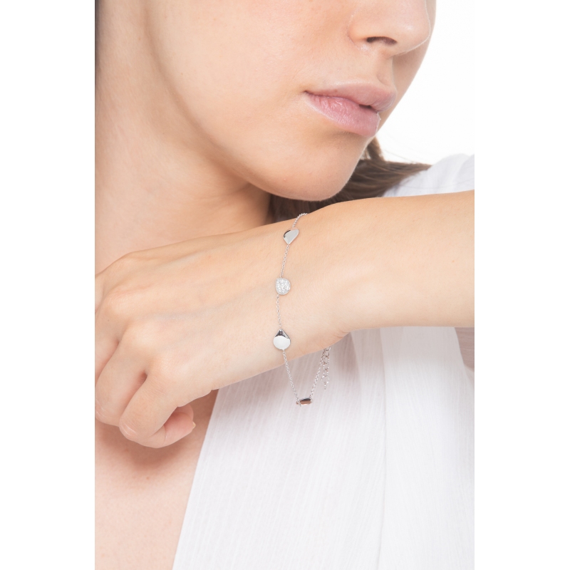Bracciale in oro bianco 18k con 4 gocce lucide e 1 centrale in diamanti