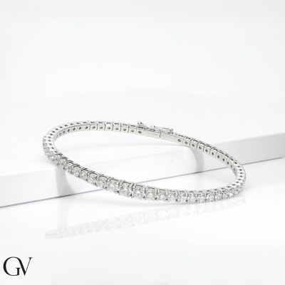 Bracciale semirigido in oro bianco 750 con diamanti a scalare