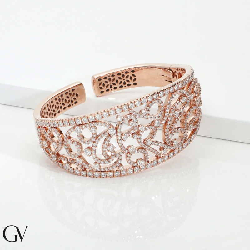 Bracciale design rigido in oro rosa 18k con diamanti