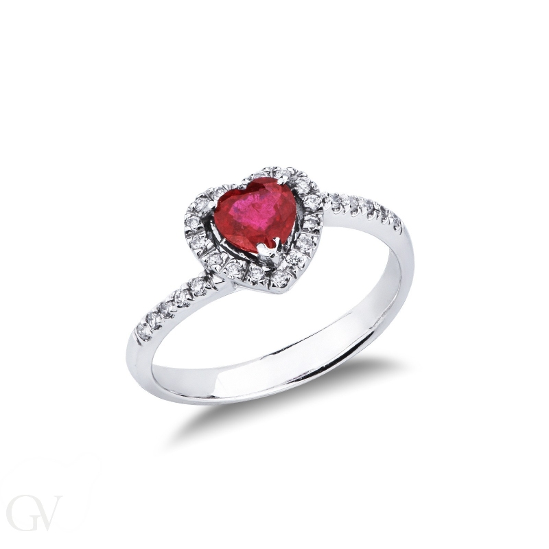 Halo ring with a central ruby heart cut and diamonds in white gold 18k