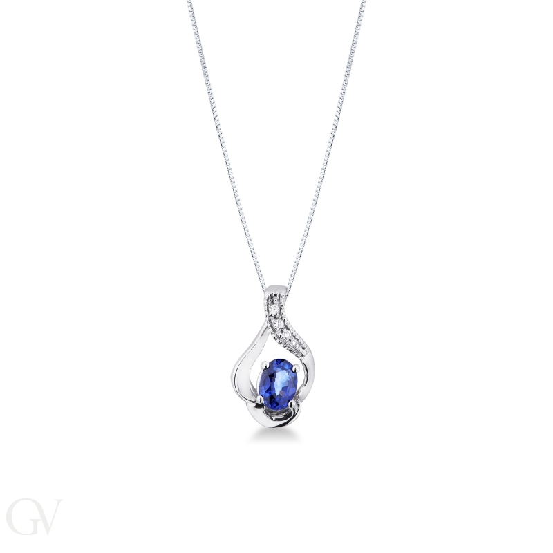 White gold 18k pendant with diamonds and blue sapphire