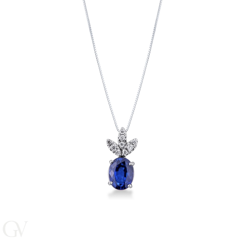 White gold 18k pendant with diamonds and a oval blue sapphire