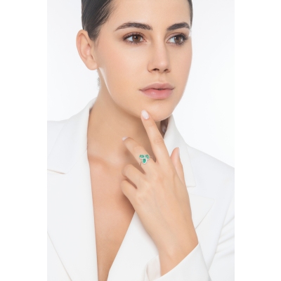 White gold 18k ring with three oval cut emeralds and halo diamonds 