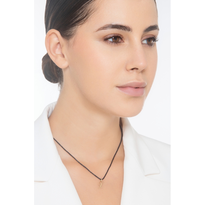 Ciondolo con lettera iniziale X corsivo in oro giallo 18k