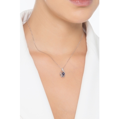 White gold 18k pendant with diamonds and blue sapphire