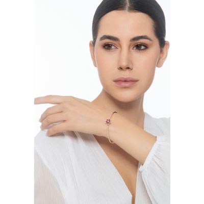 Bracciale fiore rigido in oro rosa 18k con rubini e diamanti