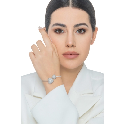 Bracciale in oro bianco 18k con due cuori in diamanti