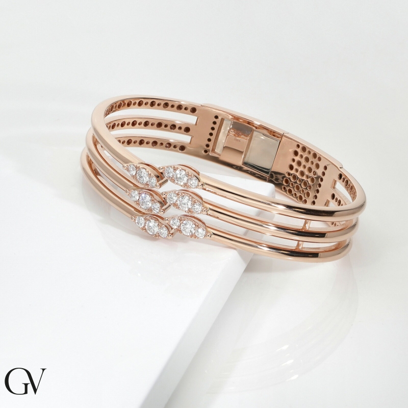 Bracciale design in oro rosa 18k con diamanti 