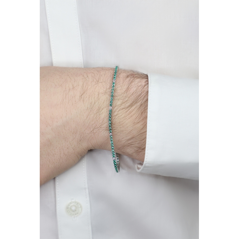 Wire links tennis bracelet with emeralds and diamonds