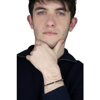 Elegant tennis bracelet with black and white diamonds