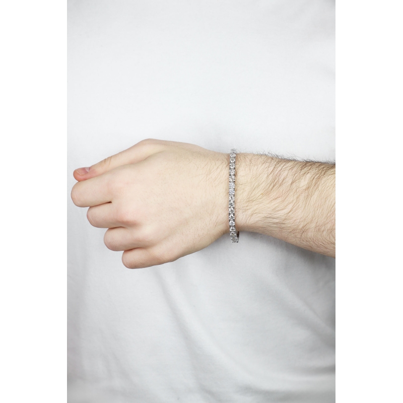 Bracciale tennis lineare a griffe in oro bianco 18k diamanti
