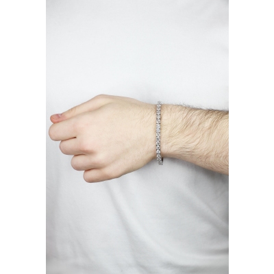 Bracciale tennis lineare a griffe in oro bianco 18k diamanti