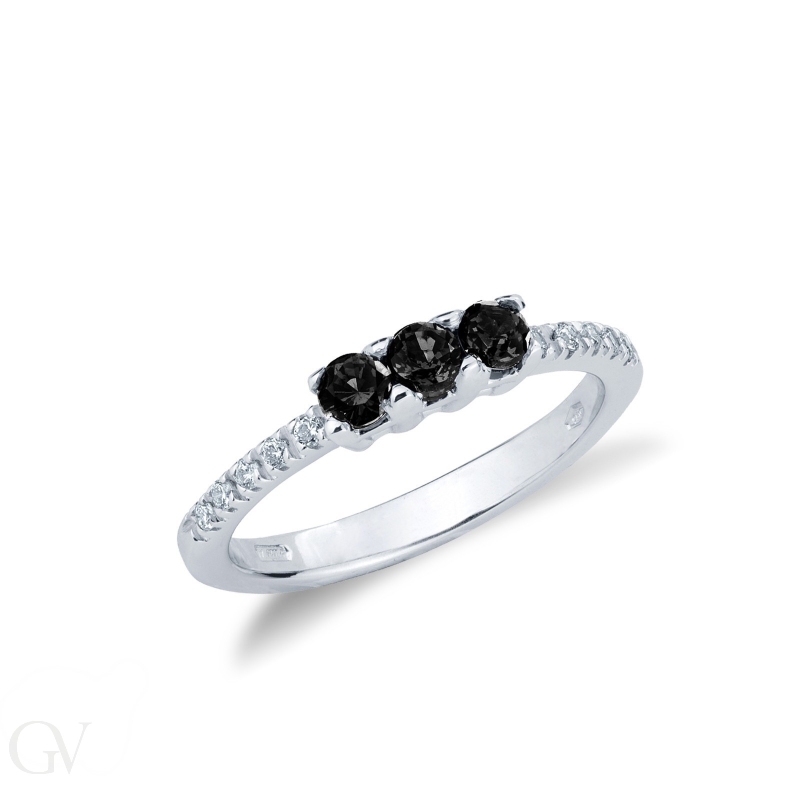 Trilogy ring with black central diamonds and diamond shoulder set