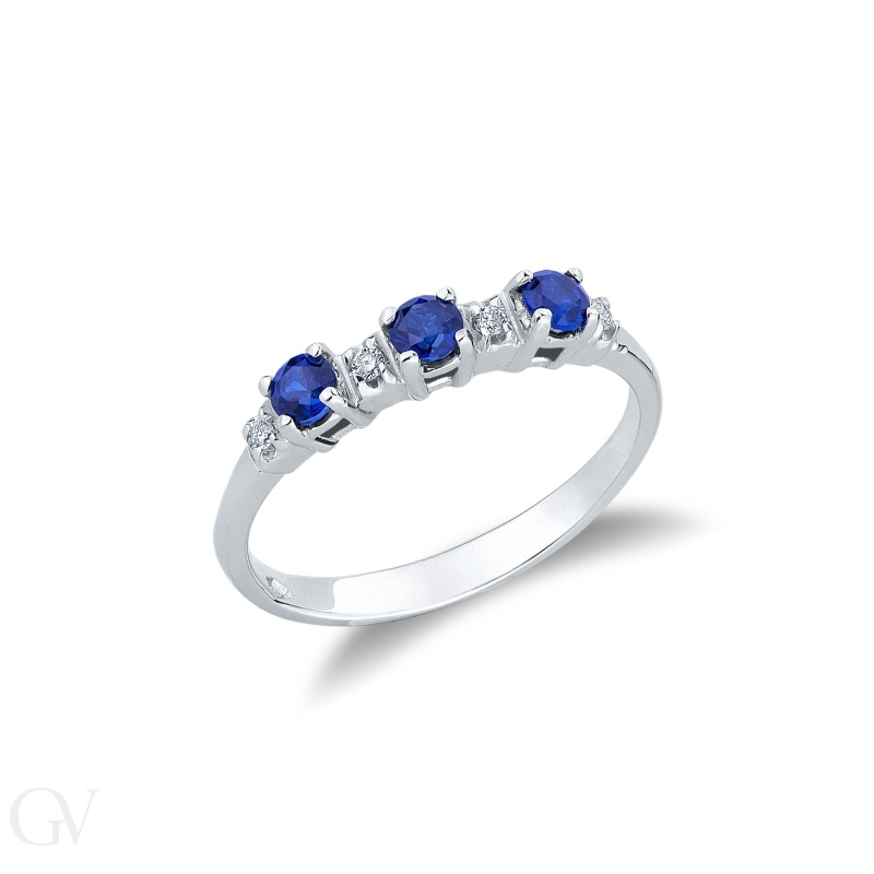 Trilogy type ring with blue sapphires and diamonds 