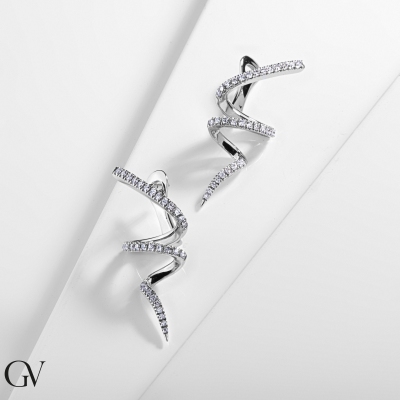 Orecchini design spirale in oro bianco 18k con diamanti