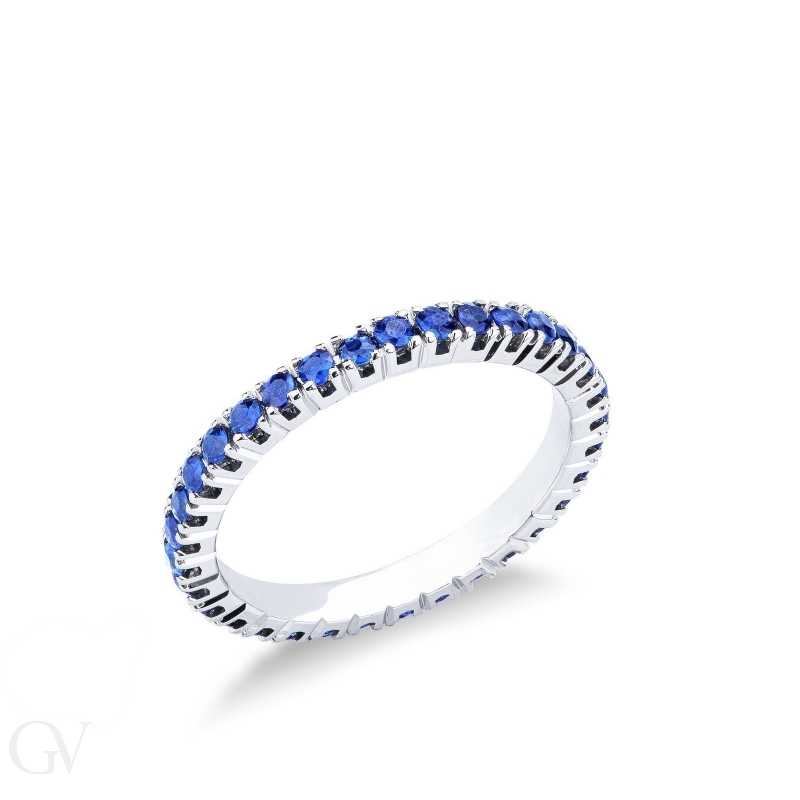 18k white gold eternity ring with blue sapphires