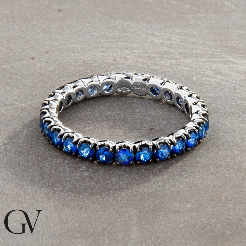 18k white gold full eternity ring with blue sapphires 