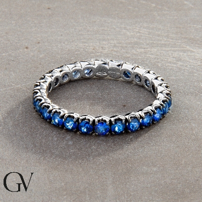 18k white gold full eternity ring with blue sapphires 