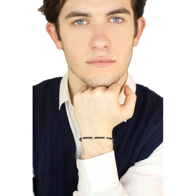 Pyramid top tennis bracelet with black and white round cut diamonds