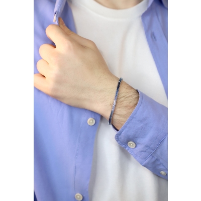 Bracciale Tennis in oro bianco 18k con Zaffiri blu sfumati taglio princess.