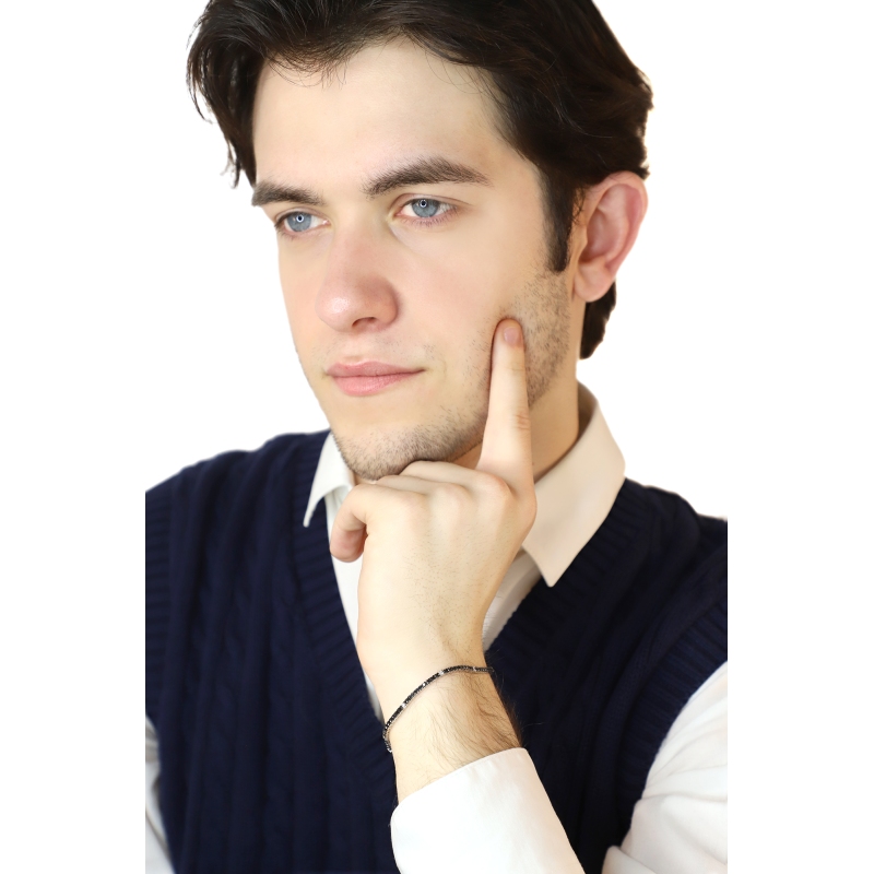 18k white gold tennis bracelet with black and white diamonds and burnished tips