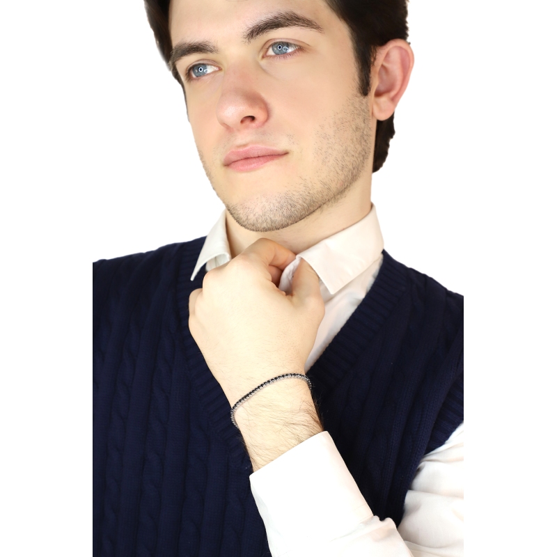 Tennis bracelet in 18k white gold with black diamonds