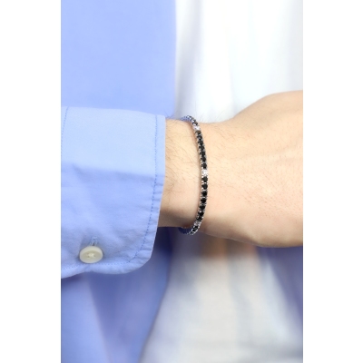 18k white gold tennis bracelet with black and white diamonds, round cut