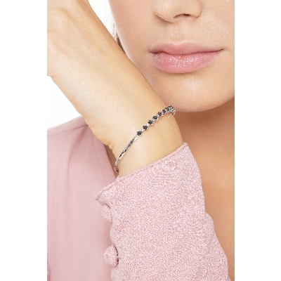 Rigid bracelet with black and white diamonds