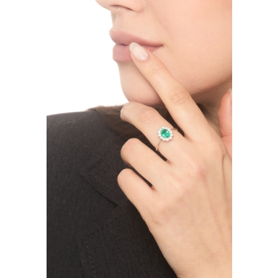 ANELLO CONTORNO CON 12BRILLANTI E SMERALDO OVALE MM6X4